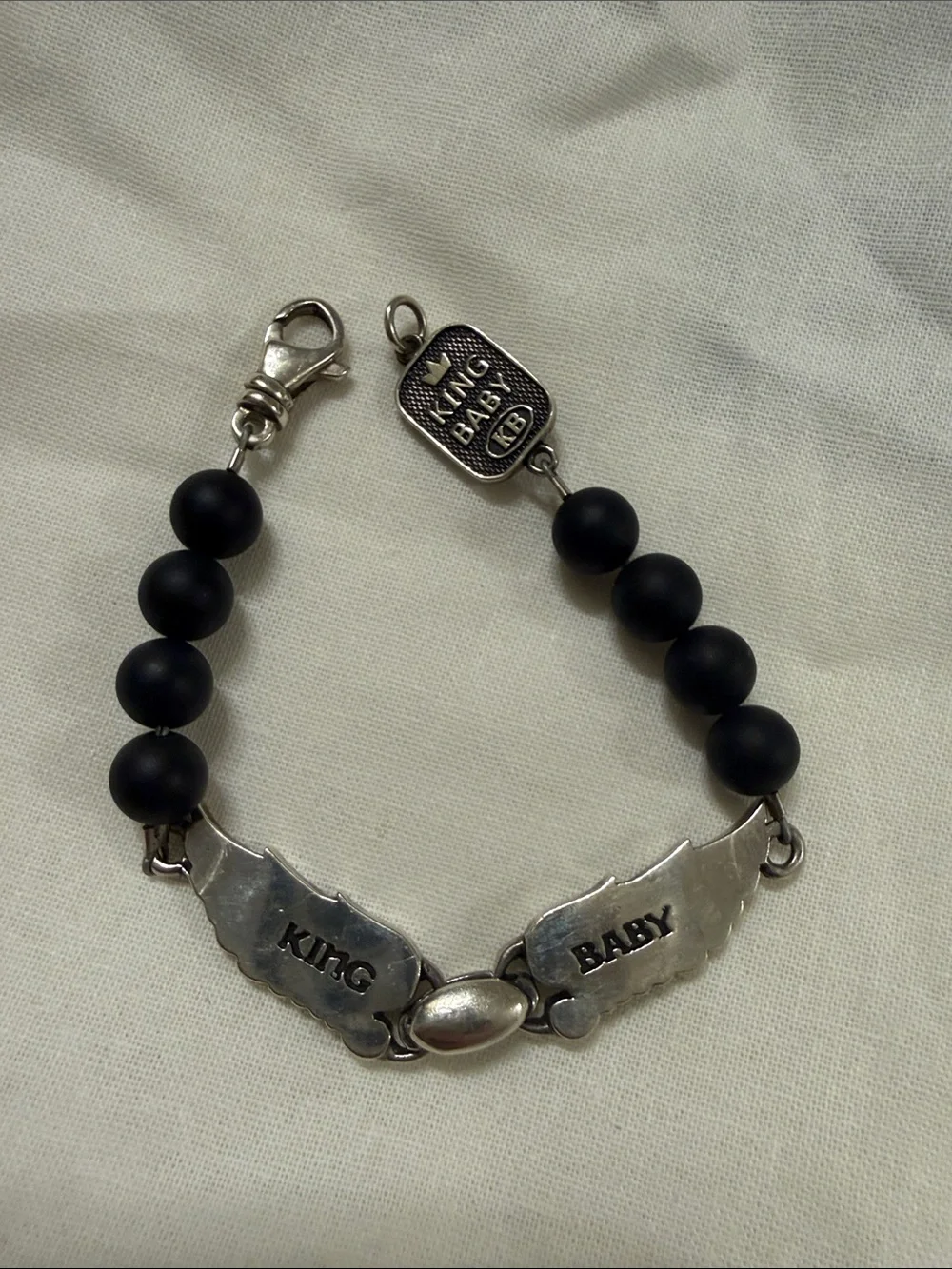 King Baby Studio Black Bead Bracelet with Sterling Wing Motif
